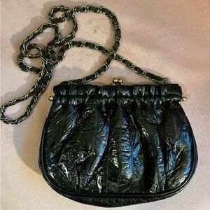 Vintage cross body eel skin and brass bag with kiss lock closure